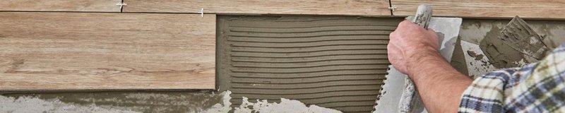 floor tile being installed