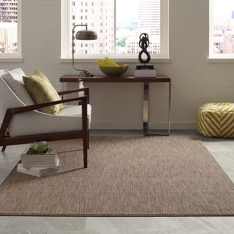 Complementary rugs and flooring at Mayfair Home Design