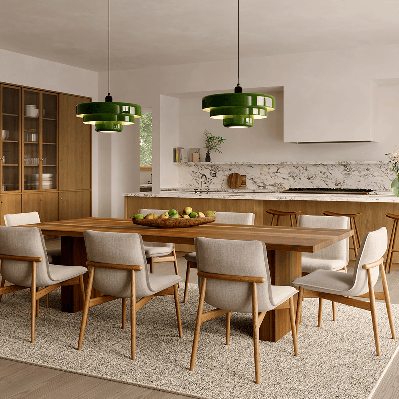 A beige area rug under a kitchen table in a white kitchen