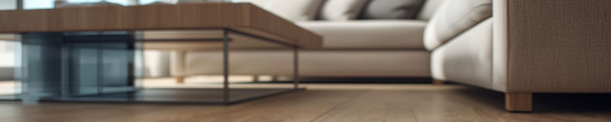 A close up view of laminate flooring in a living room